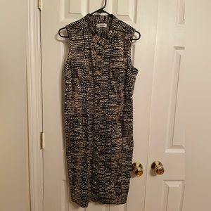Calvin Klein sleeveless dress. Size 12, snap button front with pockets